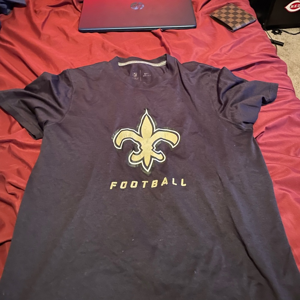 Old and worn NFL saints shirt adult small